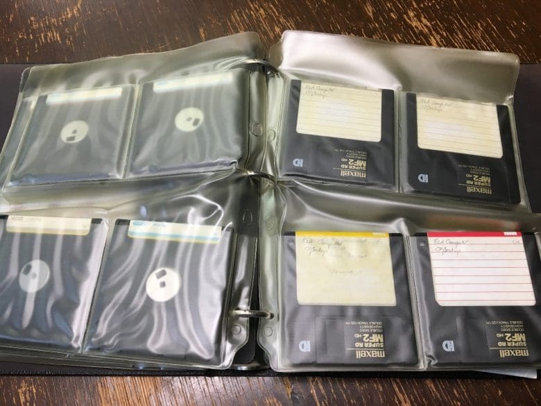 Various coloured floppy discs in a plastic folder