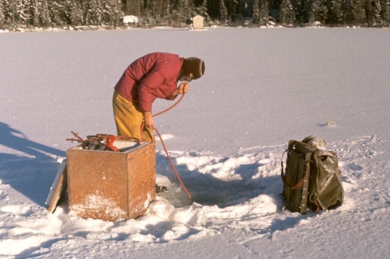 limnologist researches on a frozen lake in Northern Ontario