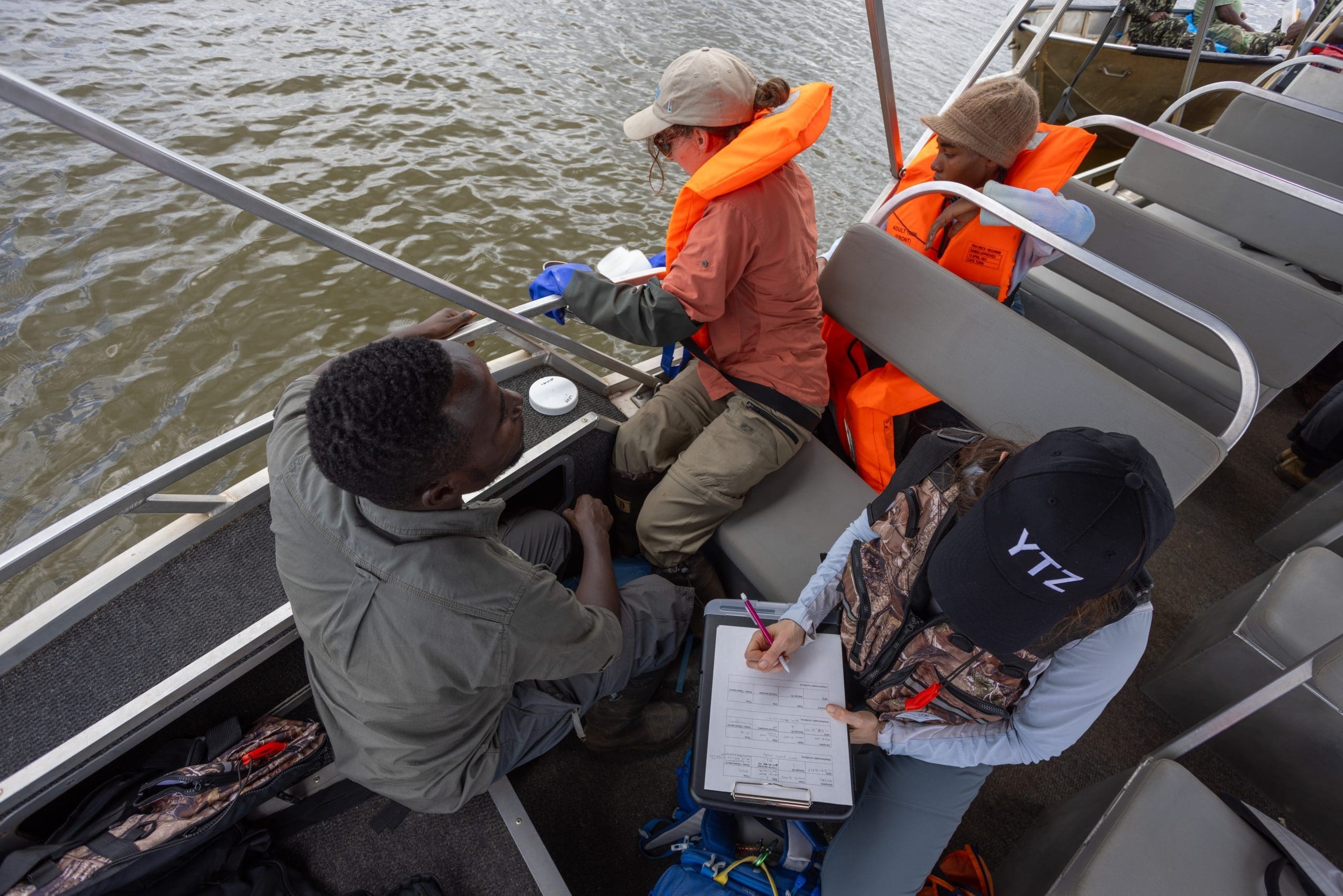 Desiree Langenfeld, Chelsea Rochman and Adrien Nkundimana sample microplastics from a central location on Lake Ihema. We also collected samples from the Kagera River inflow and the shoreline near a ranger station, so we could get a basic idea of how microplastics may be distributed across the lake.