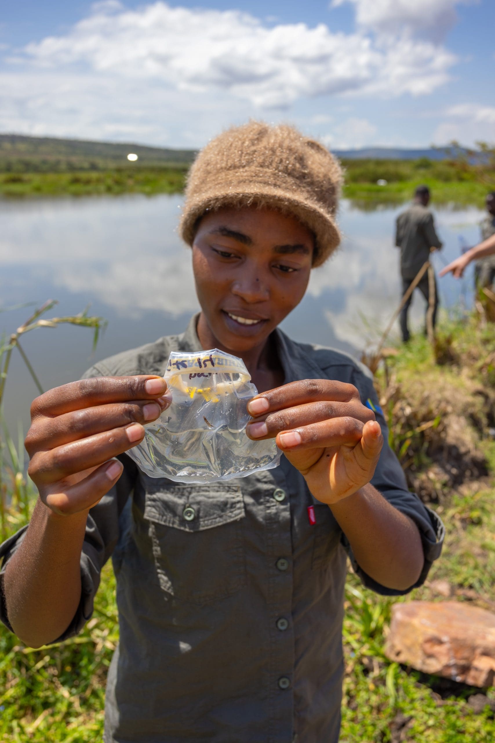 Emerance Tuyipfukamire shows us what the microplastics sample looks like once collected. These particles cannot be seen with the naked eye so it does look a little like a bag of water. Once taken back to the laboratory, the samples are digested to remove the organic matter and the microplastics are counted and characterized under a microscope.